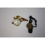 AN OCTAGONAL 18 CARAT GOLD CASED WRIST WATCH TOGETHER WITH ANOTHER A/F