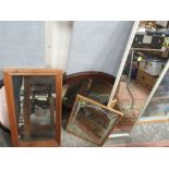 AN OAK FRAMED OVAL WALL MIRROR TOGETHER WITH A PINE FRAMED RECTANGULAR WALL MIRROR AND TWO OTHERS (