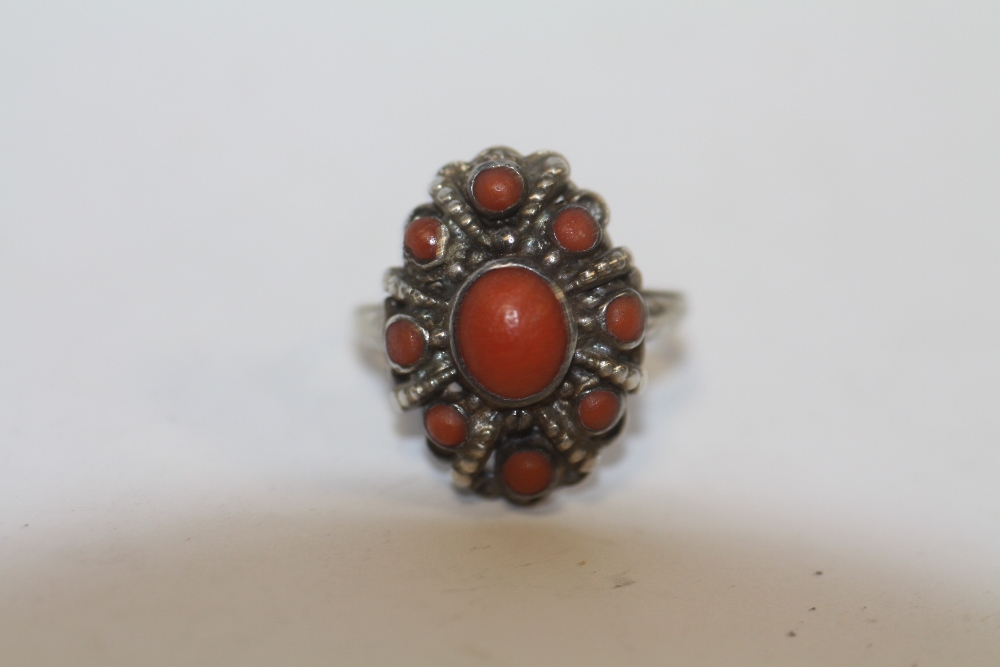 A VINTAGE SILVER & CORAL RING