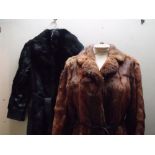 A LADIES VINTAGE BLACK LEATHER AND CONEY FUR COAT, complete with original belt, fully lined,