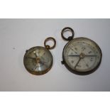 TWO ANTIQUE BRASS COMPASSES