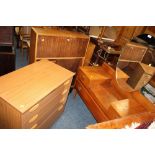 A RETRO TEAK DRESSING TABLE, SIDE CABINET AND SCHREIBER CHEST OF DRAWERS (3)