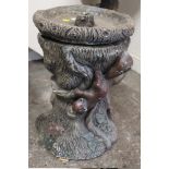 A TREE TRUNK DESIGN BIRD BATH WITH SQUIRREL FIGURES