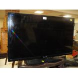 A PANASONIC 32" FLAT SCREEN TV & REMOTE