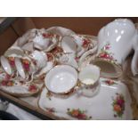 A TRAY OF ROYAL ALBERT OLD COUNTRY ROSES CHINA TO INCLUDE A COFFEE POT, CUPS AND SAUCERS ETC.