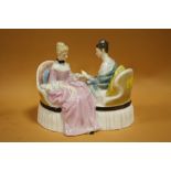 A ROYAL DOULTON FIGURE GROUP 'HEART TO HEART' HN 2276