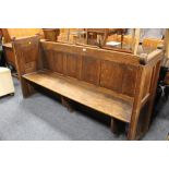 AN OAK VINTAGE PEW, W 185 CM A/F - SQUARE PANE ABSENT BOTTOM RIGHT