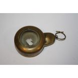 AN ANTIQUE BRASS MINORS POCKET WATCH CASE