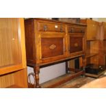 A VINTAGE OAK SIDEBOARD