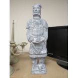 A LARGE FIGURE OF AN ORIENTAL WARRIOR