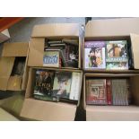 A LARGE QUANTITY OF DVDS AND CDS ETC.