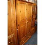 A HONEY PINE DOUBLE WARDROBE H-183 CM W-95 CM