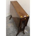 AN ANTIQUE MAHOGANY SUTHERLAND TABLE