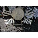 A FOLD-UP METAL GARDEN TABLE AND 2 CHAIRS