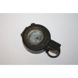 A WWII FIELD / MARCHING COMPASS
