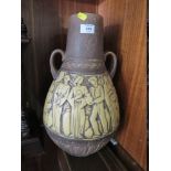 A LARGE TWIN HANDLED WEST GERMAN FIGURATIVE VASE