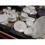 A LARGE COLLECTION OF UNFINISHED, UNMARKED WHITE CHINA IN THE STYLE OF ROYAL ALBERT TO INCLUDE
