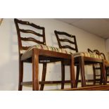 A PAIR OF MAHOGANY DINING CHAIRS