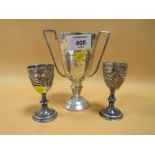 A HALLMARKED SILVER TROPHY TOGETHER WITH A PAIR OF H/M SILVER EGG CUPS,