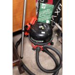 A HENRY MICRO VACUUM CLEANER WITH ACCESSORIES