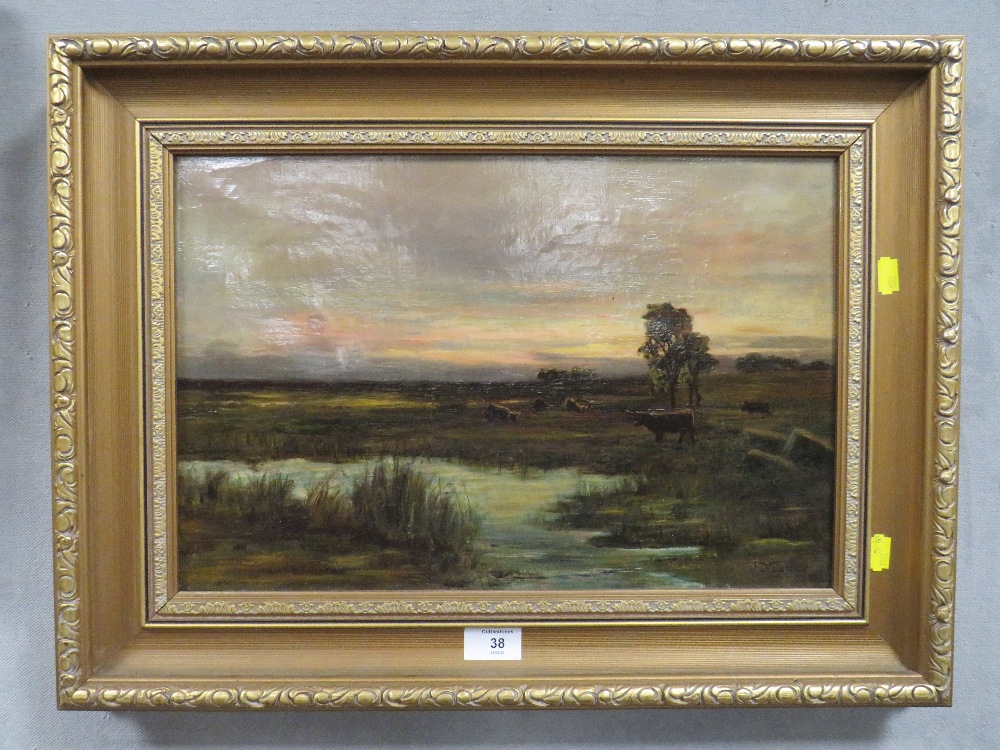 J.D. TAYLOR - A GILT FRAMED ANTIQUE OIL ON CANVAS DEPICTING CATTLE GRAZING BESIDE A RIVER, SIGNED