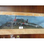 A HANDMADE MODEL OF A HURRICANE DISPLAY CASE