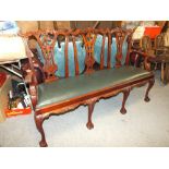 A MODERN CHIPPENDALE STYLE CARVED THREE SEATER BENCH / SOFA - W 164 CM