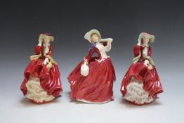 THREE ROYAL DOULTON FIGURES CONSISTING OF TWO TOP O' THE HILL HN1834, and Autumn Breezes HN1934