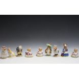 A COLLECTION OF NINE ROYAL DOULTON AND BESWICK BEATRIX POTTER AND BRAMBLY HEDGE FIGURES, tallest 10