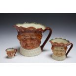 THREE GRADUATING ROYAL DOULTON CHARACTER JUGS - OLD KING COLE, consisting of small D6871, medium an