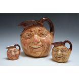 THREE GRADUATING CHARACTER JUGS - JOHN BARLEYCORN OLD LAD, consisting of small, medium and large D