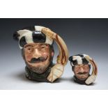 TWO ROYAL DOULTON CHARACTER JUGS - THE TRAPPER D6612, consisting of medium and large,H 19 cm