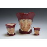 THREE GRADUATING CHARACTER JUGS - THE CARDINAL, consisting of small, medium and large D5327, H 16 c