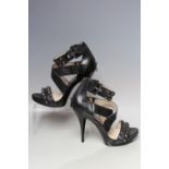 A BOXED PAIR OF MICHAEL KORS 'ROCK N ROLL BLACK LEATHER SANDALS, EU size 39Condition Report:Appear