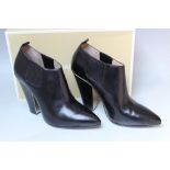 A BOXED PAIR OF MICHAEL KORS 'LACY' BLACK LEATHER BOOTS, EU size 39 1/2Condition Report:Minimal