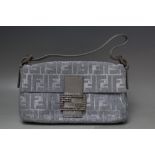 A FENDI SILVER METALLIC MONOGRAM BAGUETTE EVENING BAG, with leather strap and decorative buckle stud