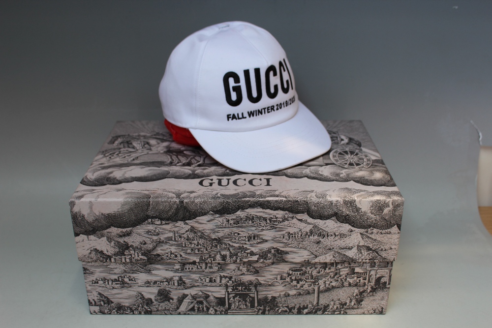 A GUCCI BASEBALL CAP, in box