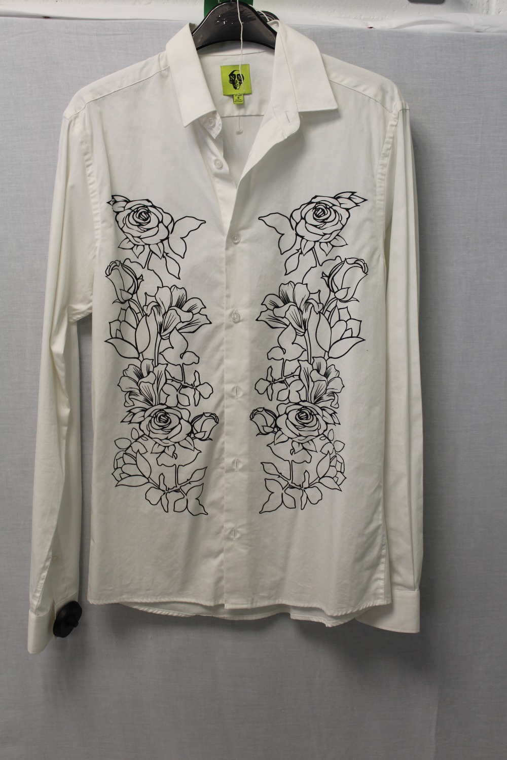 NM 328, a gents embroidered white shirt