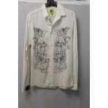 NM 328, a gents embroidered white shirt