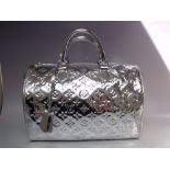 A LOUIS VUITTON SILVER MONOGRAM VERNIS SPEEDY BAG, with double top handle, padlock and key fob, dust