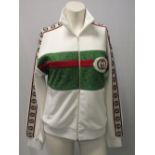 GUCCI, a ladies white track top with green panel