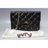 A MICHAEL KORS BLACK QUILTED LEATHER BAG WITH STUD EMBELLISHMENT, with gold tone hardware and