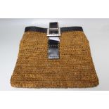 A MICHAEL KORS RAFFIA FOLD OVER CLUTCH BAG, basket weave effect, black leather band to top edge with