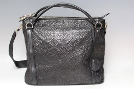 A LOUIS VUITTON BLACK MONOGRAM HOBO STYLE SHOULDER BAG, with double loop handles and a shoulder