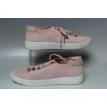 A PAIR OF MICHAEL KORS PALE PINK LACE UP TRAINERS. textile 'knit' effect uppers, textile sole, US