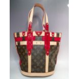 A LOUIS VUITTON RUBIS SALINA PM BAG, with double top handles, natural leather trim and red patent