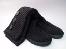 A PAIR OF 'CLASSIC CARDY KNIT' UGG BOOTS, in black, UK size 7.5Condition Report:minimal signs of