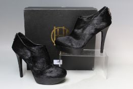 A PAIR OF HOUSE OF HARLOW PONYSKIN PLATFORM WEDGE SHOES, UK size 4.5, boxed