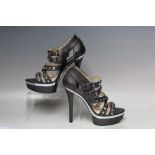 A PAIR OF MICHAEL KORS METALLIC STILETTO WEDGE SANDALS, textured finish with stud embellishment,