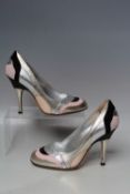 A PAIR OF DOLCE & GABBANA RETRO STYLE COURT SHOES, in metallic silver with pink and black patent